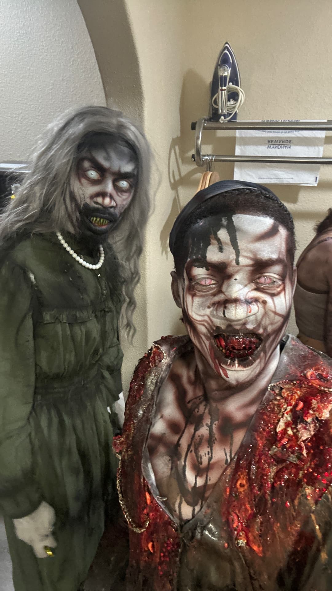Vanity and a blood-covered character backstage at Scream Hollow